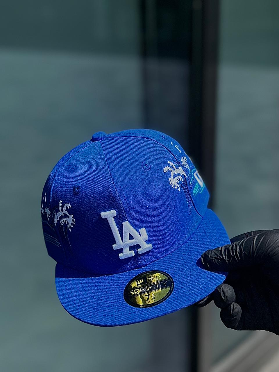 •Los Angeles Dodgers New Era Royal Tonal Wave 59FIFTY. (Fitted cap).