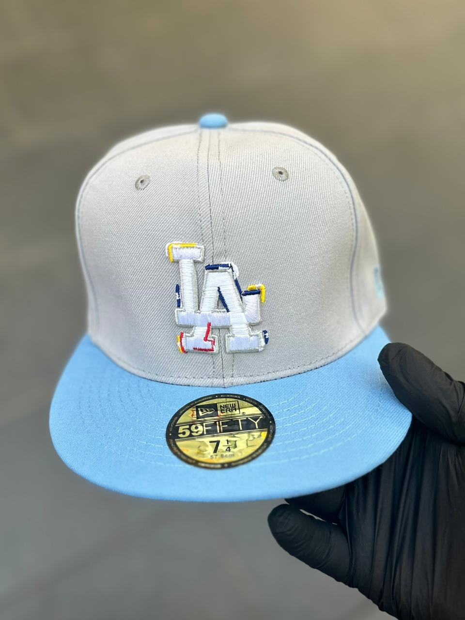 •Los Angeles dogers color brush fitted cap.